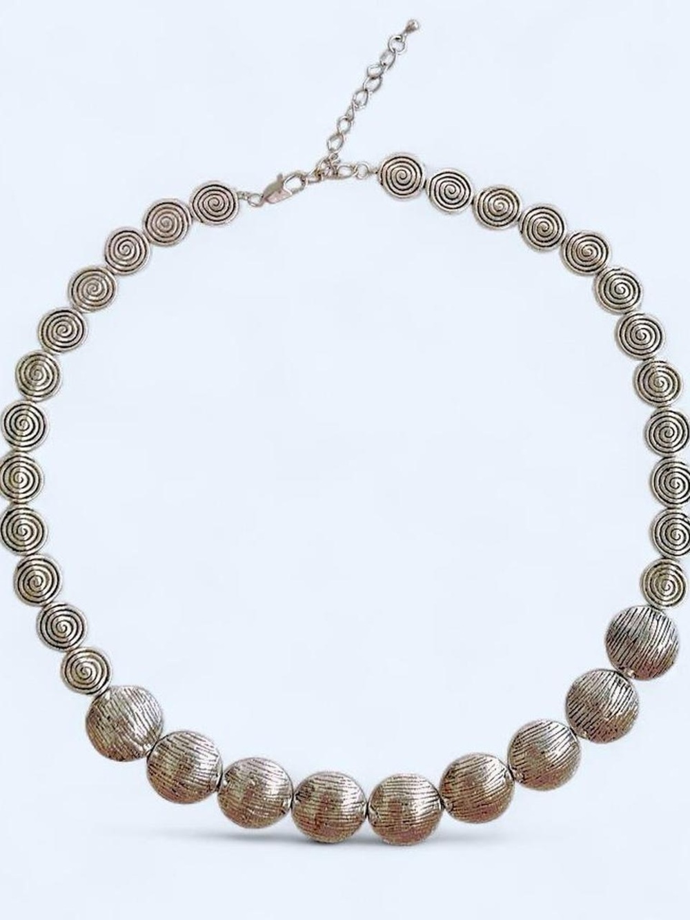 Silver tone spiral beaded necklace
